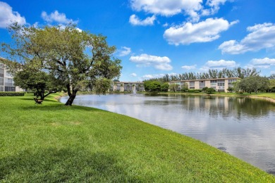 Spacious 2 bed, 2 bath condo in the popular Wynmoor community on Wynmoor Golf Course in Florida - for sale on GolfHomes.com, golf home, golf lot