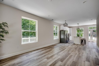 Welcome to 1673 Carriage Ln in Little River, SC -- a modern on Glen Dornoch Waterway Golf Links in South Carolina - for sale on GolfHomes.com, golf home, golf lot