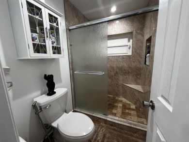 THIS HOME HAS EVERYTHING YOU ARE LOOKING FOR!  Totally upgrade & on Boca Greens Country Club in Florida - for sale on GolfHomes.com, golf home, golf lot