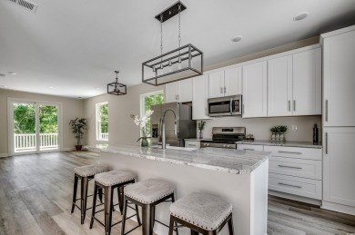 Welcome to 1673 Carriage Ln in Little River, SC -- a modern on Glen Dornoch Waterway Golf Links in South Carolina - for sale on GolfHomes.com, golf home, golf lot