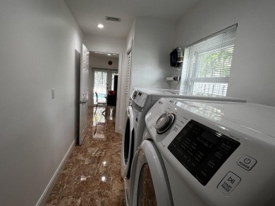 THIS HOME HAS EVERYTHING YOU ARE LOOKING FOR!  Totally upgrade & on Boca Greens Country Club in Florida - for sale on GolfHomes.com, golf home, golf lot