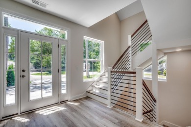 Welcome to 1673 Carriage Ln in Little River, SC -- a modern on Glen Dornoch Waterway Golf Links in South Carolina - for sale on GolfHomes.com, golf home, golf lot