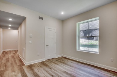 Welcome to 1673 Carriage Ln in Little River, SC -- a modern on Glen Dornoch Waterway Golf Links in South Carolina - for sale on GolfHomes.com, golf home, golf lot
