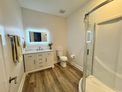 Welcome to 1673 Carriage Ln in Little River, SC -- a modern on Glen Dornoch Waterway Golf Links in South Carolina - for sale on GolfHomes.com, golf home, golf lot