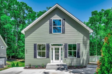 Welcome to 1673 Carriage Ln in Little River, SC -- a modern on Glen Dornoch Waterway Golf Links in South Carolina - for sale on GolfHomes.com, golf home, golf lot