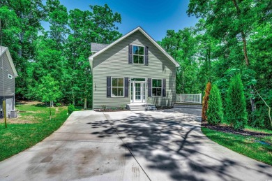 Welcome to 1673 Carriage Ln in Little River, SC -- a modern on Glen Dornoch Waterway Golf Links in South Carolina - for sale on GolfHomes.com, golf home, golf lot