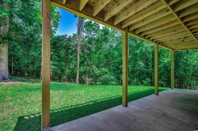 Welcome to 1673 Carriage Ln in Little River, SC -- a modern on Glen Dornoch Waterway Golf Links in South Carolina - for sale on GolfHomes.com, golf home, golf lot