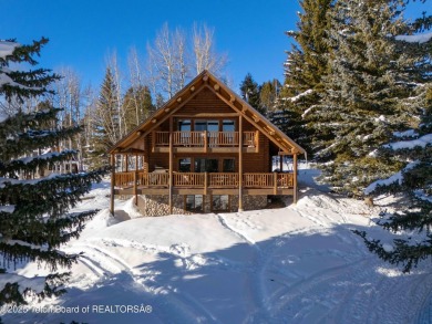 This stunning custom log home on Hole #1 of Aspen Hills Golf on Star Valley RV Golf Course in Wyoming - for sale on GolfHomes.com, golf home, golf lot