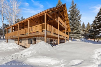 This stunning custom log home on Hole #1 of Aspen Hills Golf on Star Valley RV Golf Course in Wyoming - for sale on GolfHomes.com, golf home, golf lot