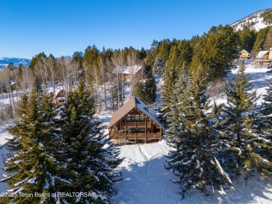 This stunning custom log home on Hole #1 of Aspen Hills Golf on Star Valley RV Golf Course in Wyoming - for sale on GolfHomes.com, golf home, golf lot