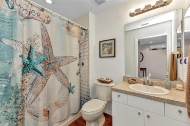 Discover this immaculate 2-bedroom, 2-bath condo with a den on Sabal Trace Golf and Country Club in Florida - for sale on GolfHomes.com, golf home, golf lot