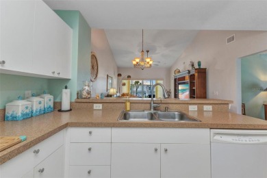 Discover this immaculate 2-bedroom, 2-bath condo with a den on Sabal Trace Golf and Country Club in Florida - for sale on GolfHomes.com, golf home, golf lot