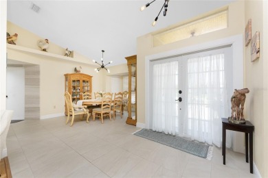 IMMACULATE  FULLY UPDATED, turnkey furnished, waterfront home on Pinemoor West Golf Club in Florida - for sale on GolfHomes.com, golf home, golf lot