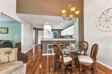Discover this immaculate 2-bedroom, 2-bath condo with a den on Sabal Trace Golf and Country Club in Florida - for sale on GolfHomes.com, golf home, golf lot