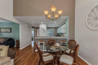 Discover this immaculate 2-bedroom, 2-bath condo with a den on Sabal Trace Golf and Country Club in Florida - for sale on GolfHomes.com, golf home, golf lot