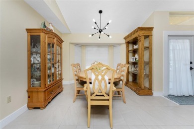 IMMACULATE  FULLY UPDATED, turnkey furnished, waterfront home on Pinemoor West Golf Club in Florida - for sale on GolfHomes.com, golf home, golf lot