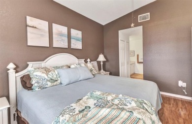 Discover this immaculate 2-bedroom, 2-bath condo with a den on Sabal Trace Golf and Country Club in Florida - for sale on GolfHomes.com, golf home, golf lot