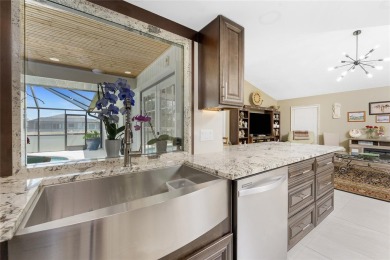 IMMACULATE  FULLY UPDATED, turnkey furnished, waterfront home on Pinemoor West Golf Club in Florida - for sale on GolfHomes.com, golf home, golf lot