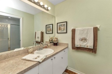 Discover this immaculate 2-bedroom, 2-bath condo with a den on Sabal Trace Golf and Country Club in Florida - for sale on GolfHomes.com, golf home, golf lot