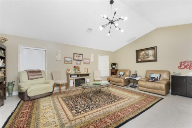 IMMACULATE  FULLY UPDATED, turnkey furnished, waterfront home on Pinemoor West Golf Club in Florida - for sale on GolfHomes.com, golf home, golf lot