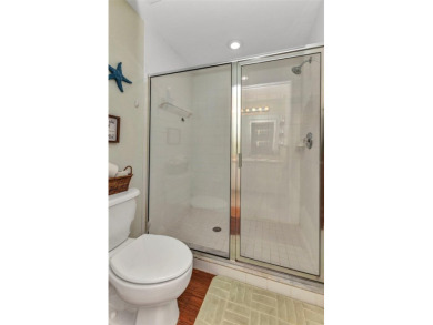 Discover this immaculate 2-bedroom, 2-bath condo with a den on Sabal Trace Golf and Country Club in Florida - for sale on GolfHomes.com, golf home, golf lot