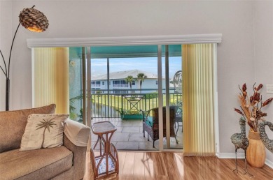 Discover this immaculate 2-bedroom, 2-bath condo with a den on Sabal Trace Golf and Country Club in Florida - for sale on GolfHomes.com, golf home, golf lot