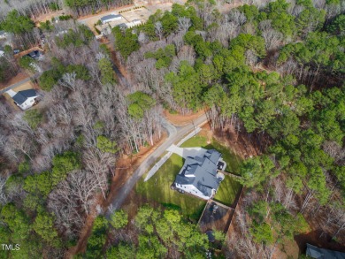 Welcome to this stunning and charming farmhouse-style, perfectly on River Golf and Country Club at Lake Royale in North Carolina - for sale on GolfHomes.com, golf home, golf lot