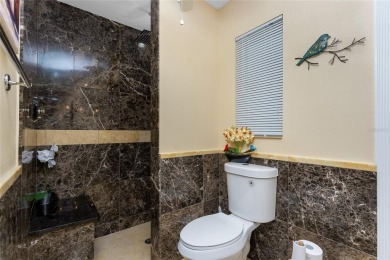 IMMACULATE  FULLY UPDATED, turnkey furnished, waterfront home on Pinemoor West Golf Club in Florida - for sale on GolfHomes.com, golf home, golf lot
