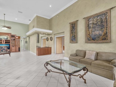 Step into this Stonebridge Country Club home with soaring on Stonebridge Golf and Country Club in Florida - for sale on GolfHomes.com, golf home, golf lot