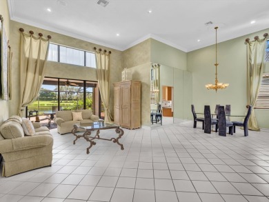 Step into this Stonebridge Country Club home with soaring on Stonebridge Golf and Country Club in Florida - for sale on GolfHomes.com, golf home, golf lot