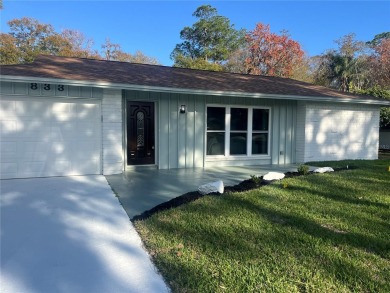 Under contract-accepting backup offers. Remodeled 55+ home with on Brooker Creek Golf Club in Florida - for sale on GolfHomes.com, golf home, golf lot