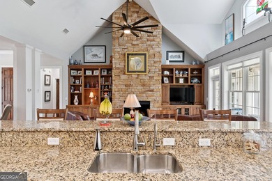 Beautiful custom-designed coastal retreat located in the highly on The Golf Club At Sanctuary Cove in Georgia - for sale on GolfHomes.com, golf home, golf lot