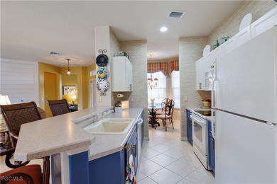 Nestled in a corner lot in the heart of Herons Glen is this on Herons Glen Golf and Country Club in Florida - for sale on GolfHomes.com, golf home, golf lot