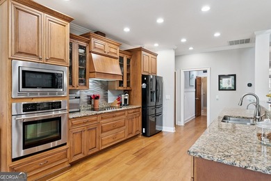 Beautiful custom-designed coastal retreat located in the highly on The Golf Club At Sanctuary Cove in Georgia - for sale on GolfHomes.com, golf home, golf lot