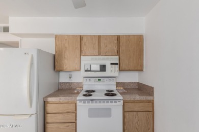 Check out this 1-bedroom townhome in a vibrant 55+community near on Sun City Country Club in Arizona - for sale on GolfHomes.com, golf home, golf lot