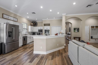 Stunning golf course home overlooking the 5th green of on Southwood Golf Club in Florida - for sale on GolfHomes.com, golf home, golf lot