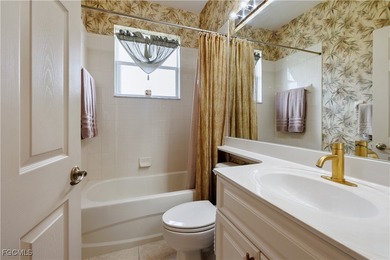 Nestled in a corner lot in the heart of Herons Glen is this on Herons Glen Golf and Country Club in Florida - for sale on GolfHomes.com, golf home, golf lot