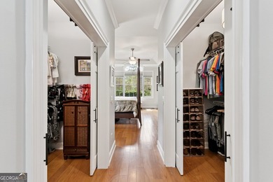 Beautiful custom-designed coastal retreat located in the highly on The Golf Club At Sanctuary Cove in Georgia - for sale on GolfHomes.com, golf home, golf lot