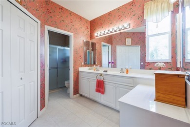 Nestled in a corner lot in the heart of Herons Glen is this on Herons Glen Golf and Country Club in Florida - for sale on GolfHomes.com, golf home, golf lot