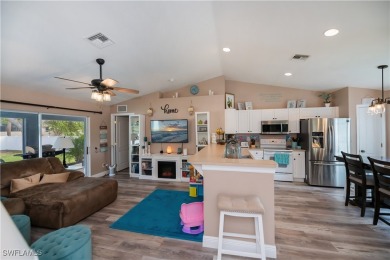 This fabulous home is situated on an oversized lot with a on Burnt Store Golf Club in Florida - for sale on GolfHomes.com, golf home, golf lot