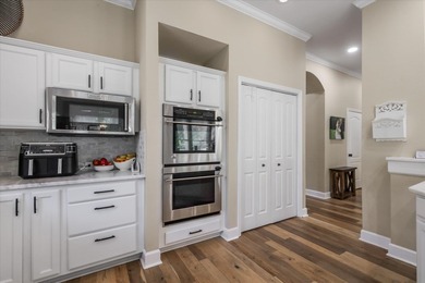 Stunning golf course home overlooking the 5th green of on Southwood Golf Club in Florida - for sale on GolfHomes.com, golf home, golf lot