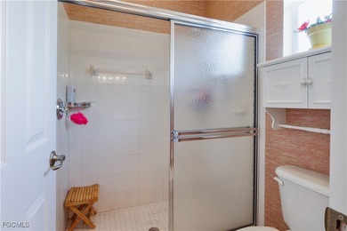 Nestled in a corner lot in the heart of Herons Glen is this on Herons Glen Golf and Country Club in Florida - for sale on GolfHomes.com, golf home, golf lot