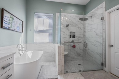 Stunning golf course home overlooking the 5th green of on Southwood Golf Club in Florida - for sale on GolfHomes.com, golf home, golf lot