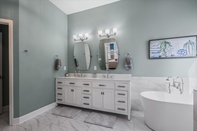 Stunning golf course home overlooking the 5th green of on Southwood Golf Club in Florida - for sale on GolfHomes.com, golf home, golf lot