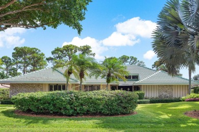 Welcome to your dream oasis at Marlwood Estates in PGA National on PGA National Golf Club in Florida - for sale on GolfHomes.com, golf home, golf lot