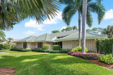 Welcome to your dream oasis at Marlwood Estates in PGA National on PGA National Golf Club in Florida - for sale on GolfHomes.com, golf home, golf lot