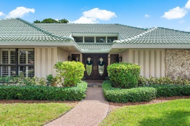 Welcome to your dream oasis at Marlwood Estates in PGA National on PGA National Golf Club in Florida - for sale on GolfHomes.com, golf home, golf lot