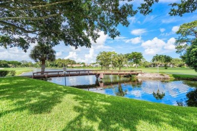 SPACIOUS WATERFRONT UNIT WITH NEW ROOF, GARAGE IN SOUGHT AFTER on Boca Lago Golf and Country Club in Florida - for sale on GolfHomes.com, golf home, golf lot