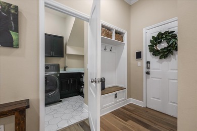 Stunning golf course home overlooking the 5th green of on Southwood Golf Club in Florida - for sale on GolfHomes.com, golf home, golf lot