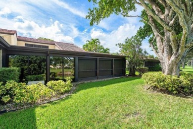 SPACIOUS WATERFRONT UNIT WITH NEW ROOF, GARAGE IN SOUGHT AFTER on Boca Lago Golf and Country Club in Florida - for sale on GolfHomes.com, golf home, golf lot